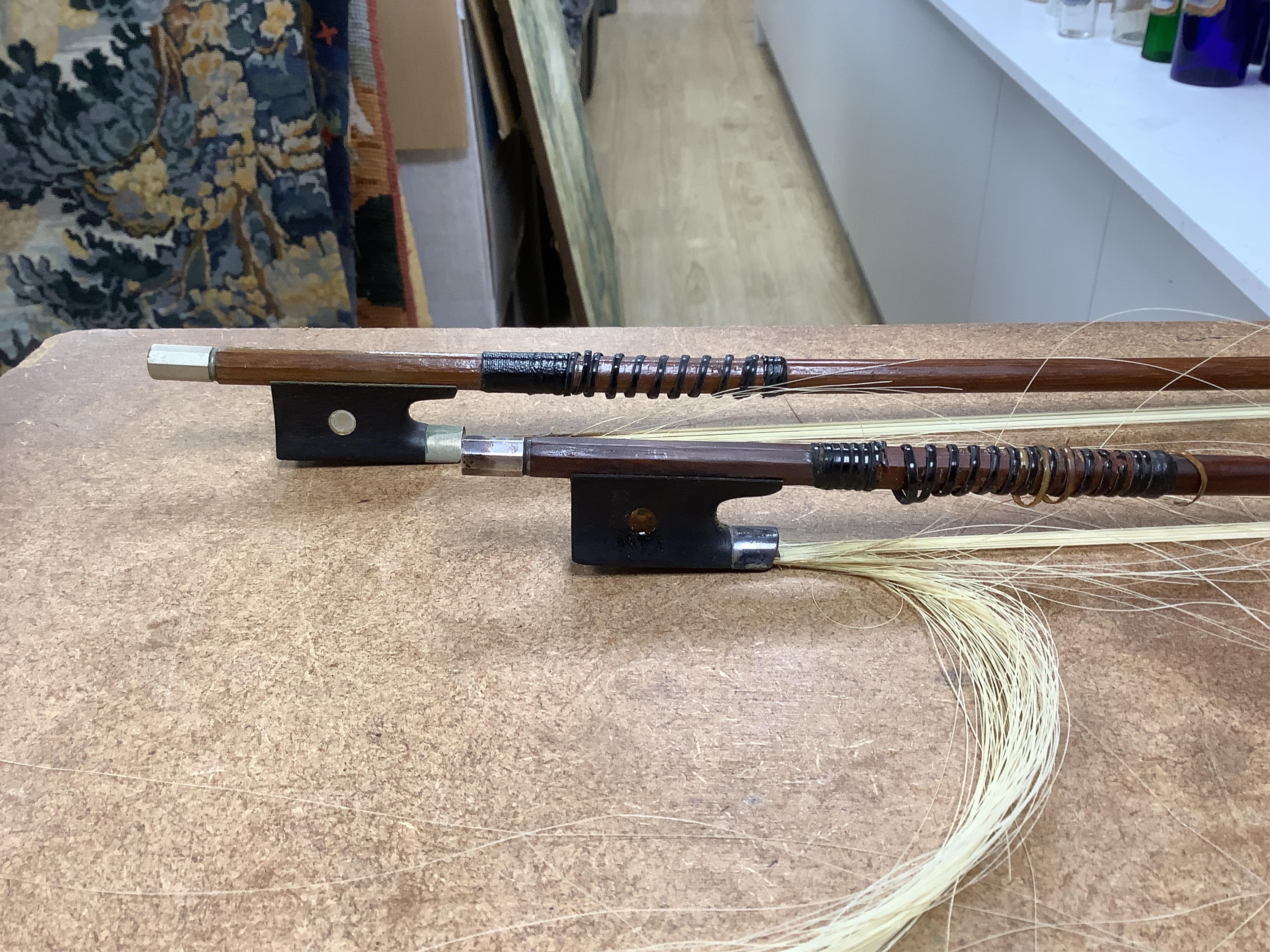 A late 19th century German violin in a Hill & Son oak case, with Hill canvas slip cover, together with an unbranded silver mounted bow, and another, ivory submission ref: 9HJU3B45 and ZC2E1GCP